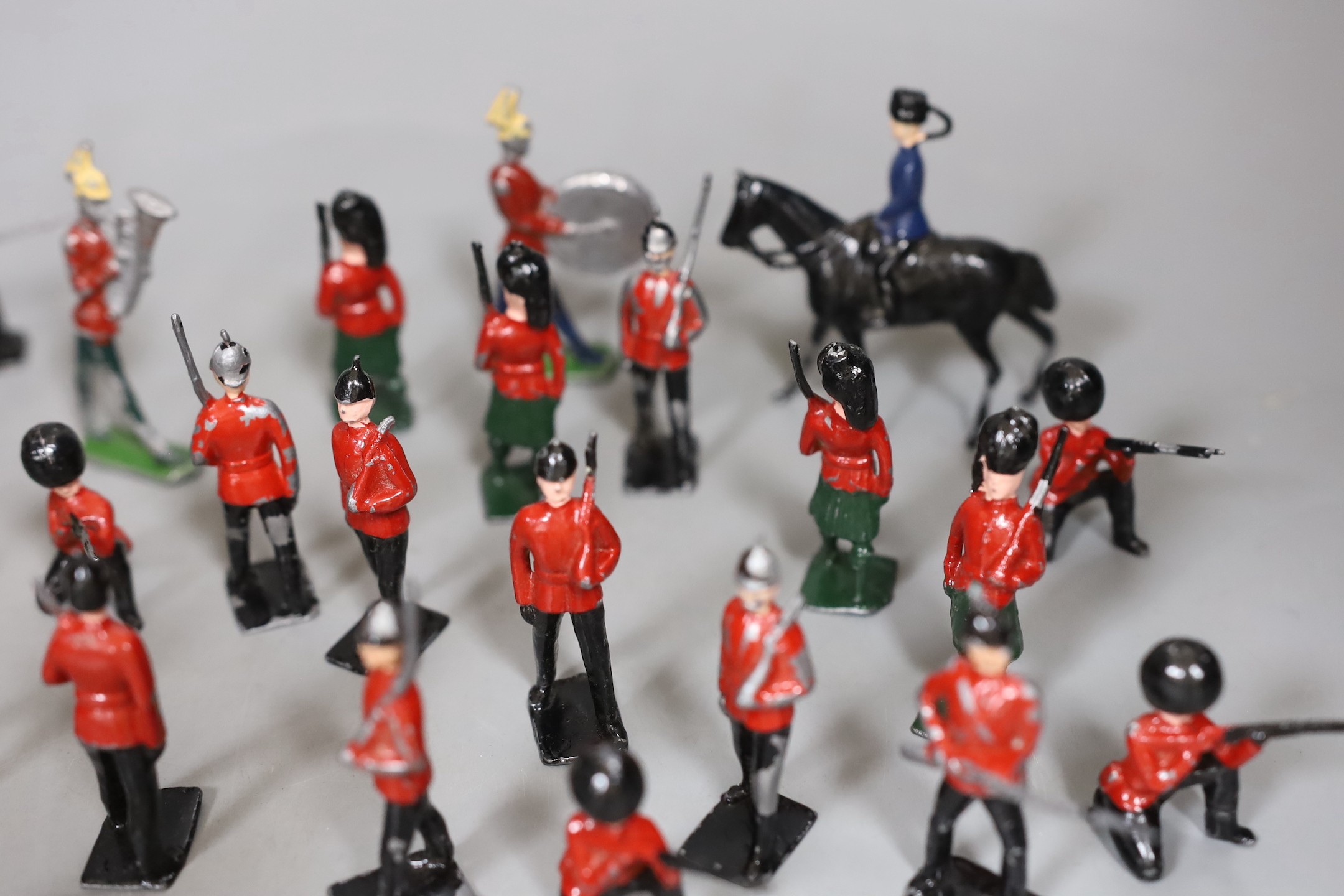 A quantity of cold painted lead soldiers and band.